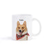 White ceramic coffee mug with a happy Corgi dog graphic wearing a red bandana, and the word 